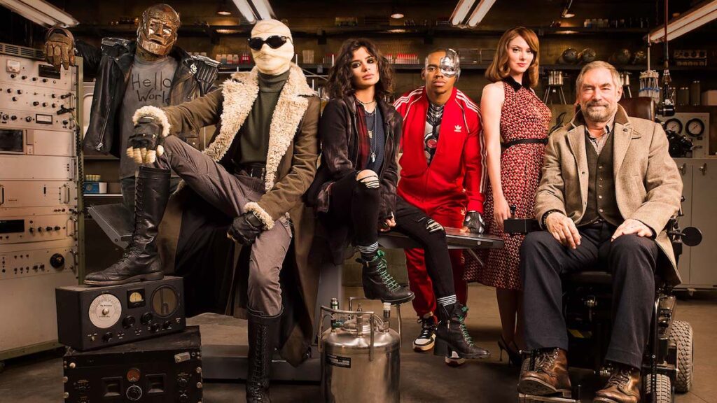 Doom Patrol: (L-R) Cliff Steel a.k.a. Robotman (Brendan Fraser), Larry Trainor a.k.a. Negative Man (Matt Bomer), Crazy Jane (Diane Guerrero), Victor Stone a.k.a. Cyborg (Joivan Wade), Rita Farr a.k.a. Elasti-Woman (April Bowlby), and Niles Caulder a.k.a. the Chief (Timothy Dalton). Image credit: DC Comics