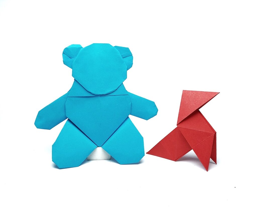 Alicia's teddy bear and red origami bird. Image credit: Netflix / Sarjit Singh